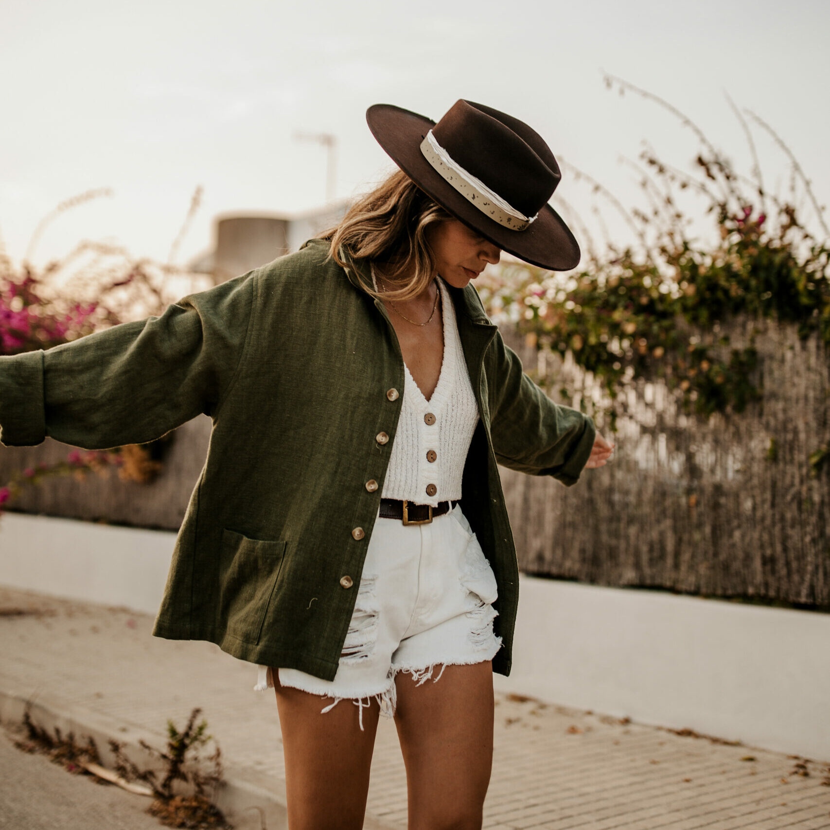 Neri wearing a hat from Crown of the Vagabond on Mallorca