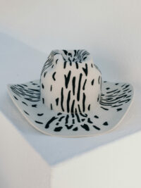 ComeScheckCome - a hat for the Rockstars. Our interpretation of a fashionable Fusion Cowboy hat shape.