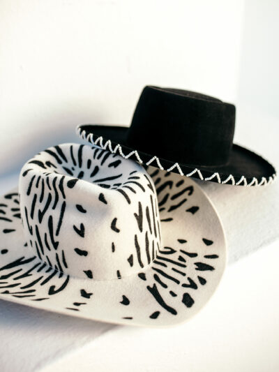 ComeScheckCome - a hat for the Rockstars. Our interpretation of a fashionable Fusion Cowboy hat shape.